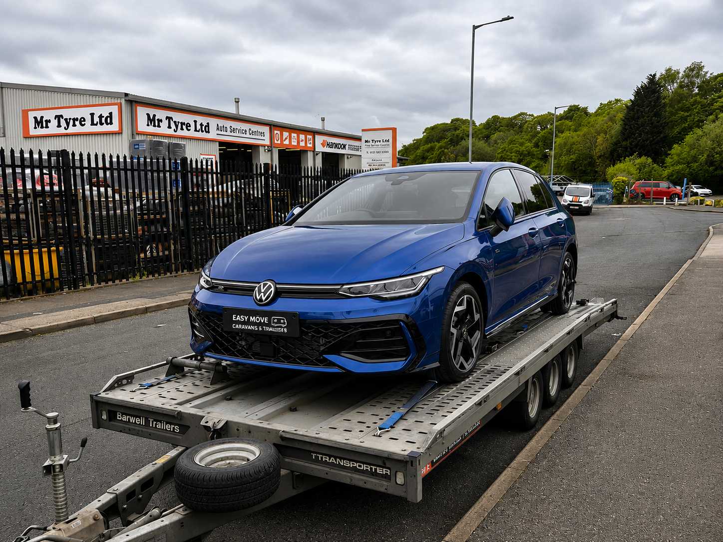 Vehicle transported on a flatbed trailer